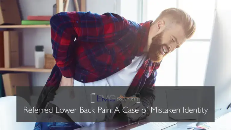 Man grabbing his back due to lower back pain