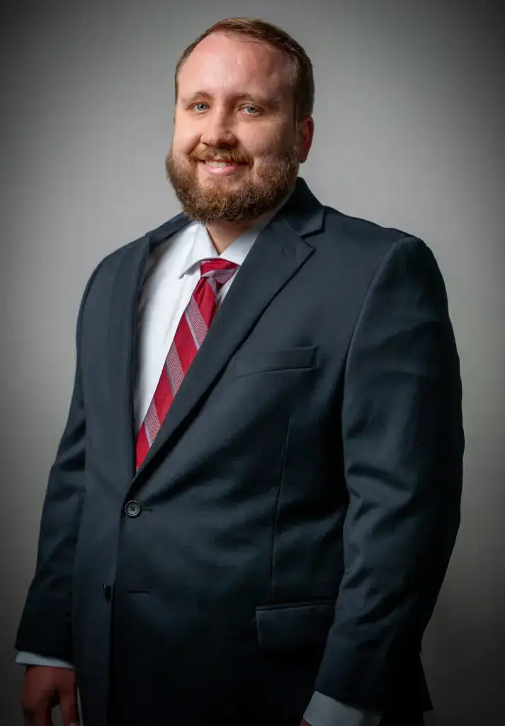 Colby Kunkel PT, DPT with EMG Solutions in a suit